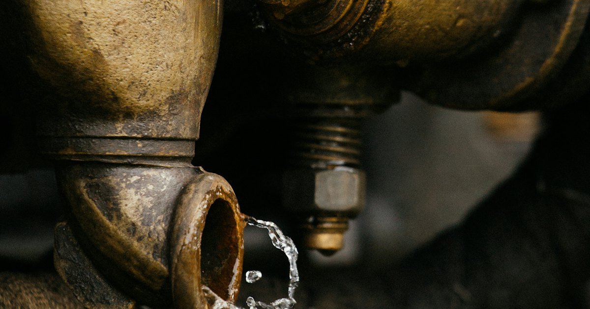 Water drop on a brass pipe