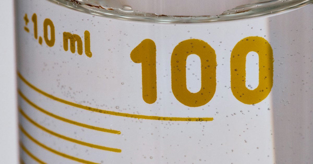Measuring cylinder showing a 100 ml mark